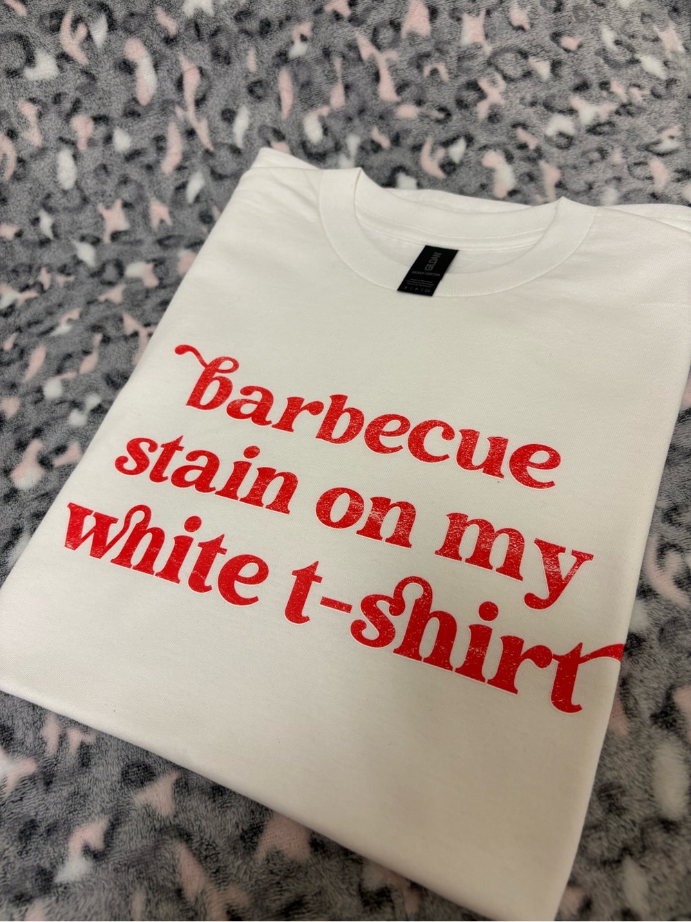 White Short Sleeve Graphic Tee with Red Script Text